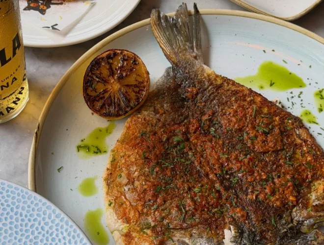Whole sea bream at El Gato Negro