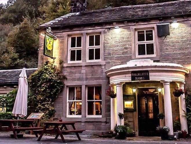 Tables for outside dining at the front of The Hinchcliffe Arms in Hebden Bridge, West Yorkshire