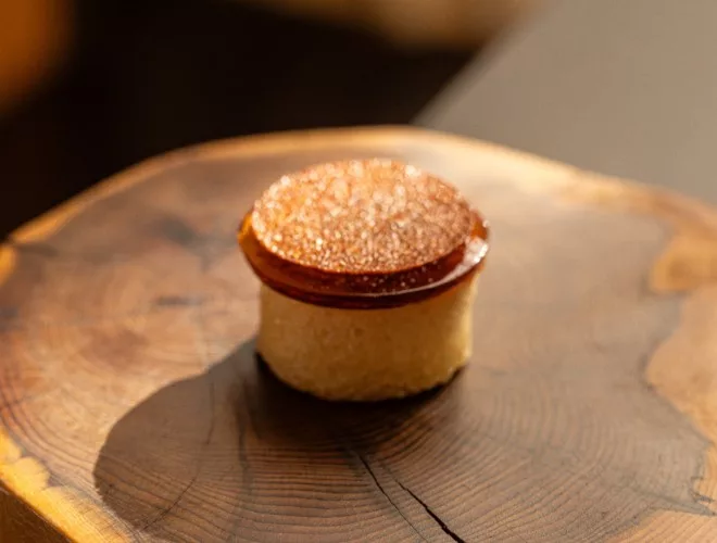 Sake crumpet with Doddingtons cheese
