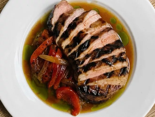 Pork collar and agrodolce peppers