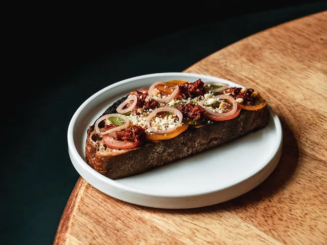 Sobrasada on Toast with tomatoes, feta and pickled shallot at 10 Tib Lane in Manchester.