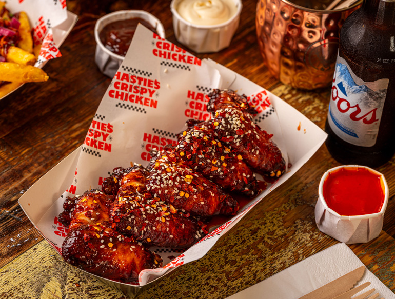 Sticky, sesame-seed-topped chicken wings at Pattersons, Liverpool