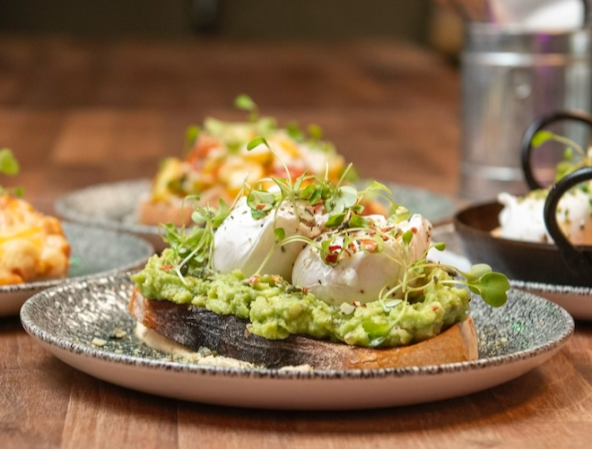 Poached egg and avocado on toast at On The Hush in Manchester.