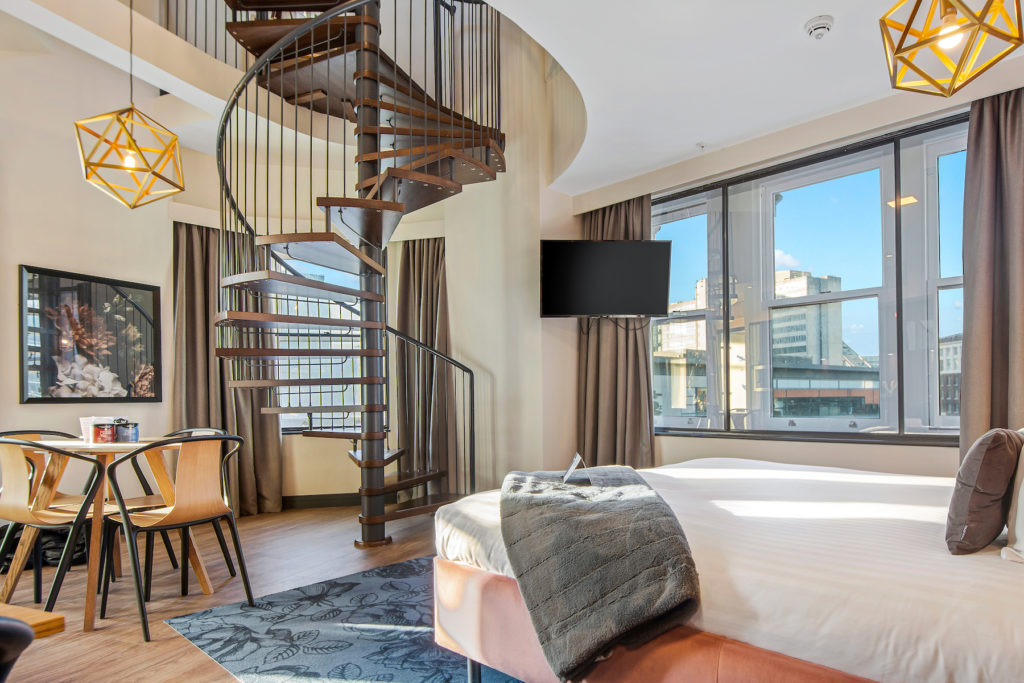 Roomzzz Manchester Victoria Sovereign Suite Spiral Staircase