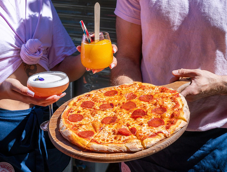 Pizza and drinks at Pong & Puck Great Northern, Manchester