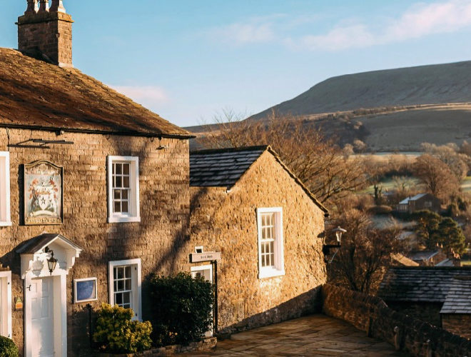 The exterior of The Assheton Arms, a country pub with rooms to stay overnight, near Pendle Hill and Clitheroe in Lancashire