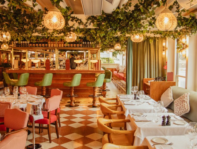 Airy interior at San Carlo Alderley Edge with ivy trailing from ceiling