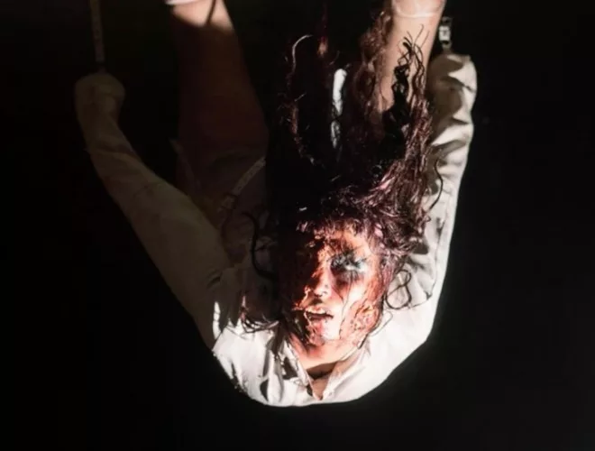 Upside down possessed girl at Farmageddon