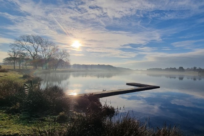 Misty winter morning at the mere in Tatton Park