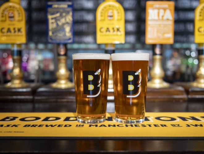 Two pints of Boddingtons on the bar at Founder's Hall
