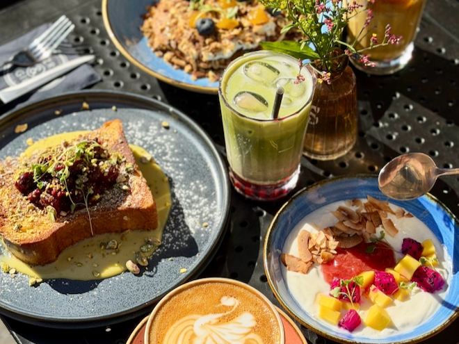 French toast, matcha, a yoghurt bowl and a coffee at Ezra and Gil in Manchester.