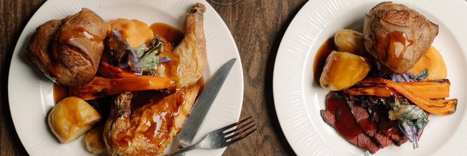 Sunday roasts at The Horse & Jockey with roast chicken on the left and roast beef on the right