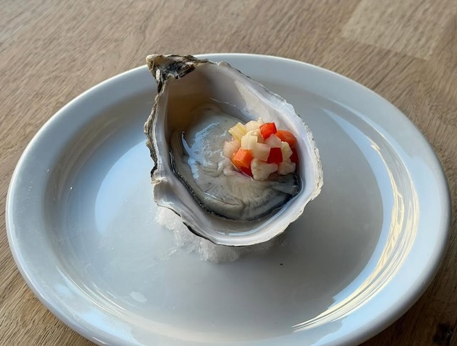 Porthilly oyster topped with a giardiniera at Cantaloupe in Stockport.