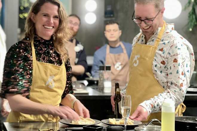 Man and woman making gyoza together at Food Sorcery Deansgate Square