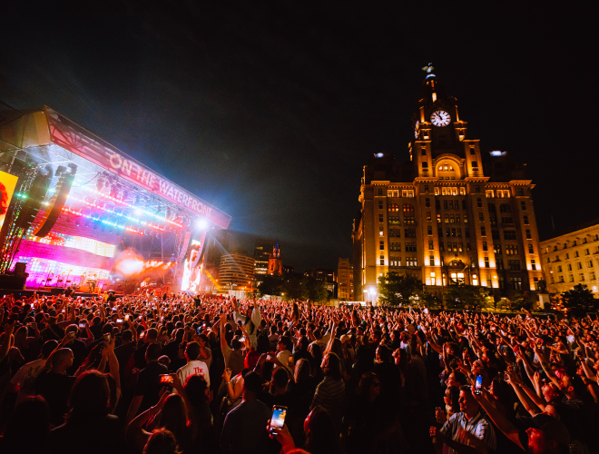 A crowd and stage at On The Waterfront festival in Liverpool.