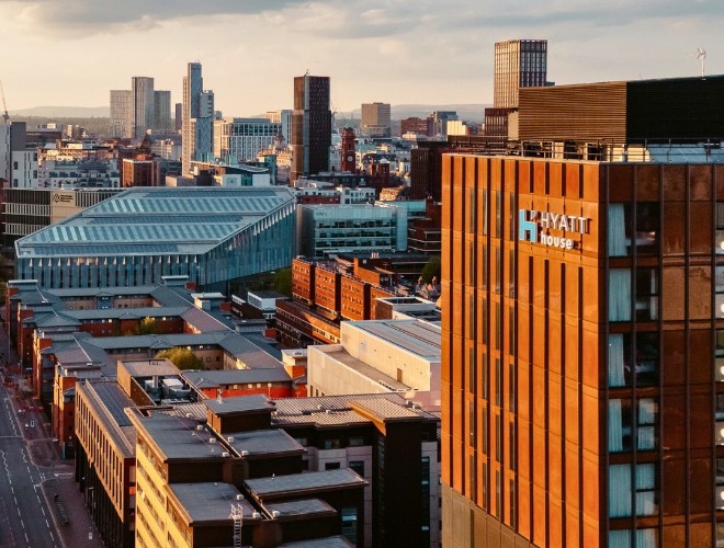 Manchester's Hyatt Hotel with the city skyline in the background