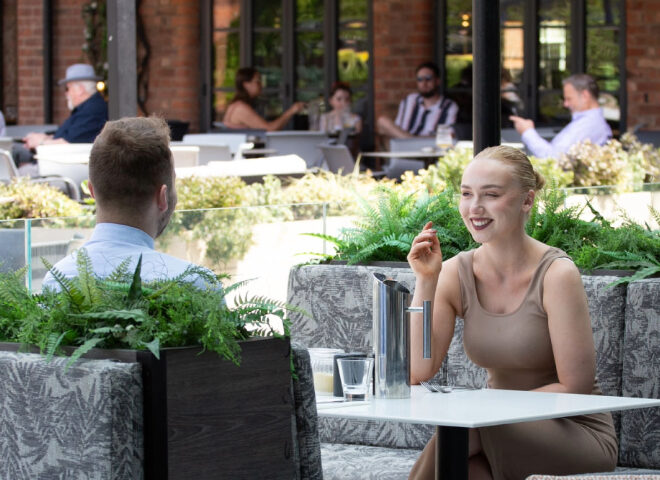 Outdoor terrace dining at Albert's Shed in Castlefield.