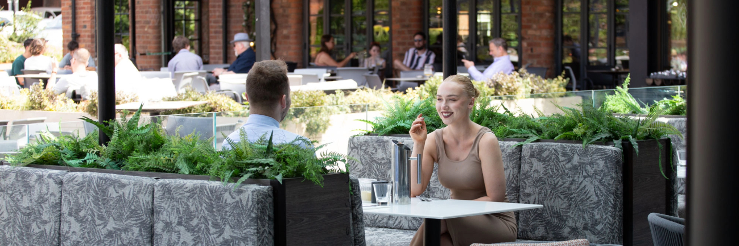 Outdoor terrace dining at Albert's Shed in Castlefield.