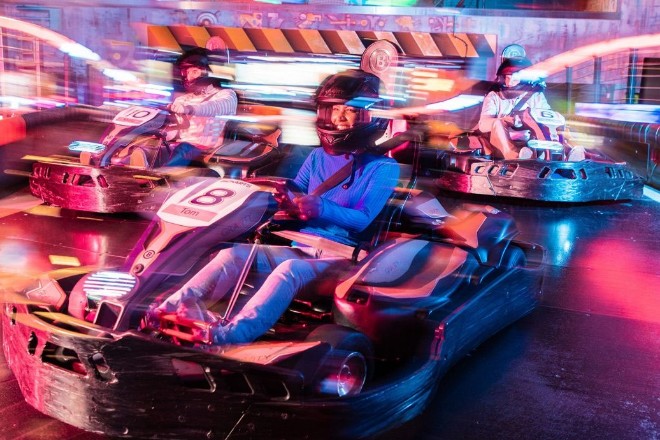 Group of adults go-karting at Gravity MAX Liverpool