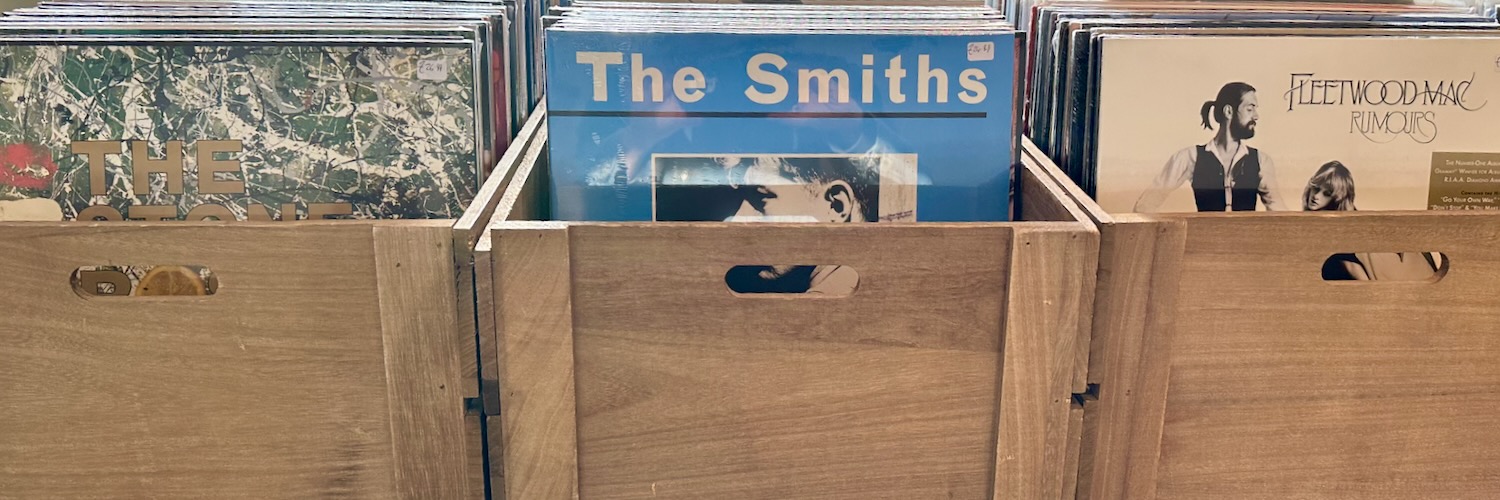 Three boxes of records at Coda Vinyl in Glossop.