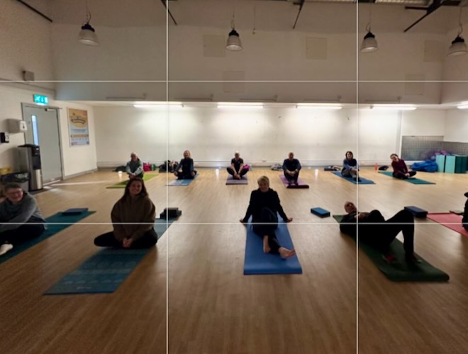 A yoga class taking place in the fitness studio at The Pelican Centre in Tyldesley.