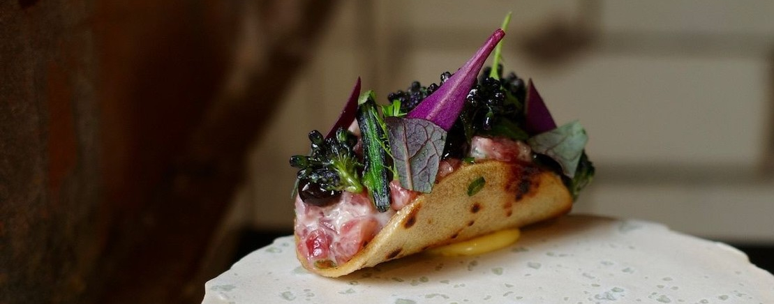 Dexter beef with black pepper, broccoli, and roasted yeast at Skof.