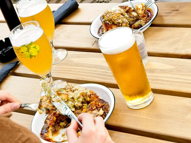 Pieminister pies and pints served outside at The Abbey in Hulme.