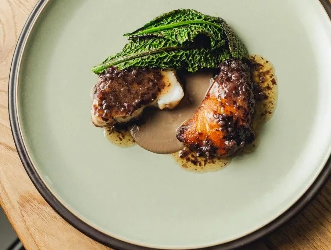 Monkfish, chestnut mushroom and cavolo nero at Higher Ground