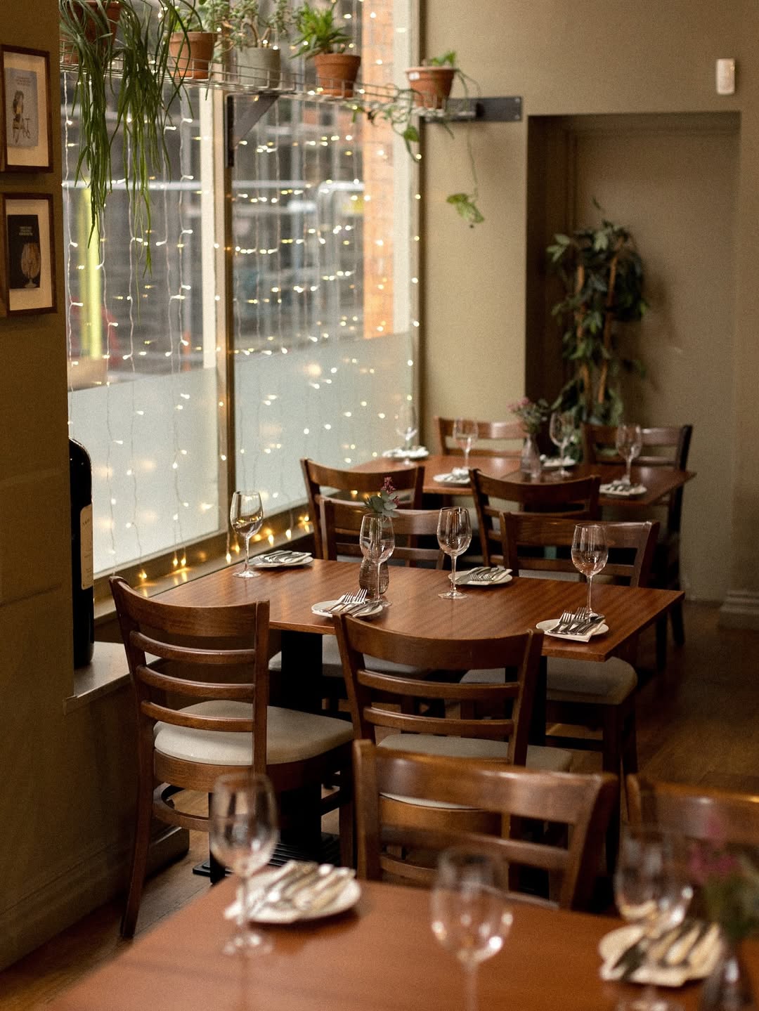 Tables set for dinner at TNQ Restaurant and Bar