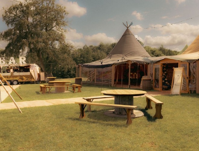 Tipis and outdoor tables at Swanley Meadows