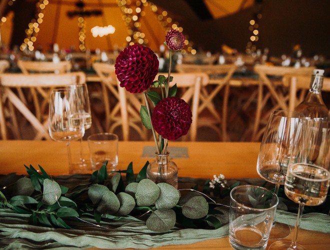 The cosy tipis, twinkling with fairy lights, make a romantic setting for your wedding breakfast