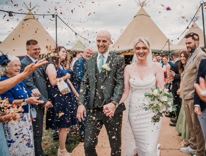 Petal confetti shower at a tipi wedding at Swanley Meadows