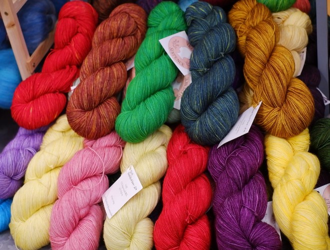 Brightly-coloured yarns in red, green, blue, brown, yellow and purple