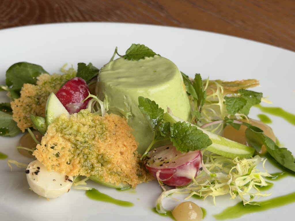 Courgette panna cotta with side salad, radishes, mint and a homemade dressing, served at Riva Hale Restaurant.