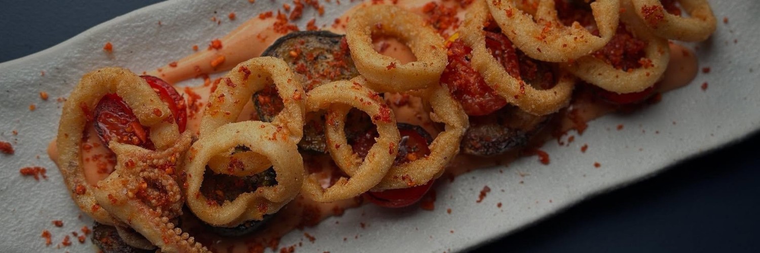 Crispy fried squid with courgette and cherry tomatoes at Engine Social Dining