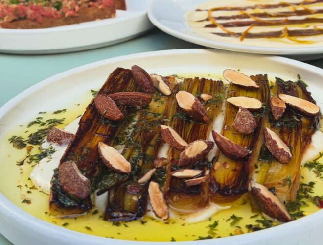 Grilled leeks with almond & burnt lemon dressing at 10 Tib Lane in Manchester.