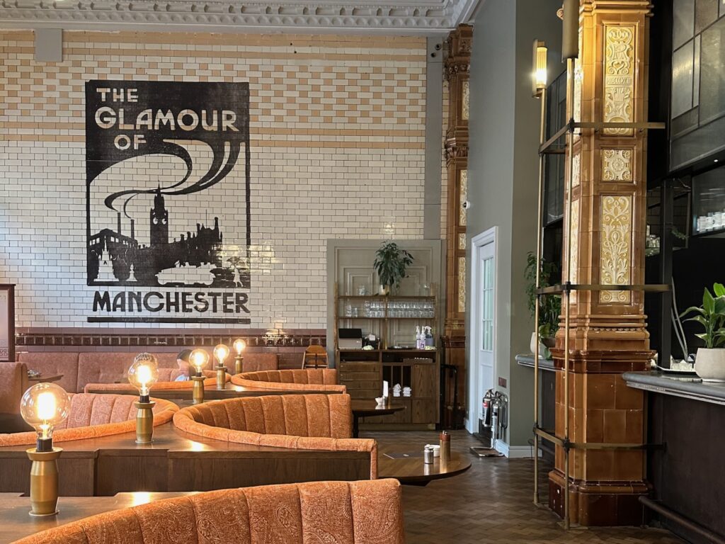 The Glamour of Manchester design on the glazed brick walls of The Refuge in Manchester.