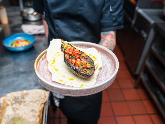 Roast stuffed aubergine served at La Famiglia in Liverpool.