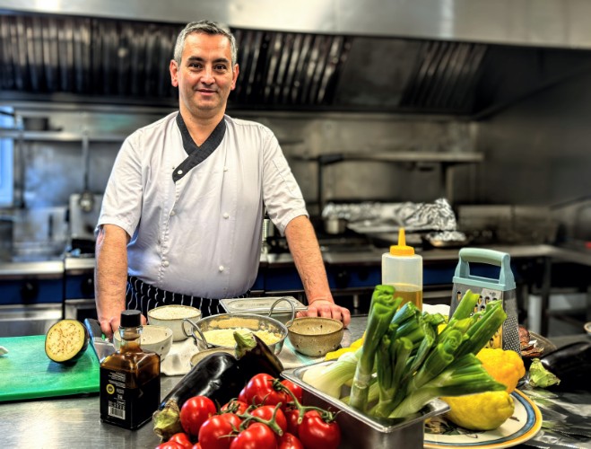 Chef Giuseppe Lombardo with the ingredients to make aubergine parmigiana risotto