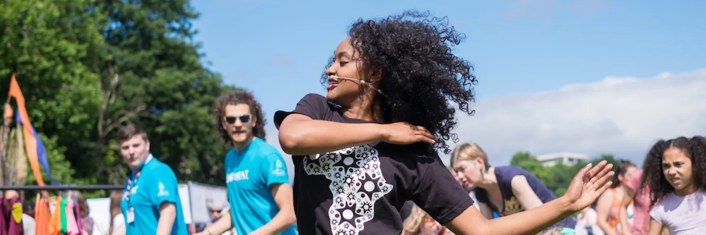 A girl dancing at Africa Oye festival in Liverpool.