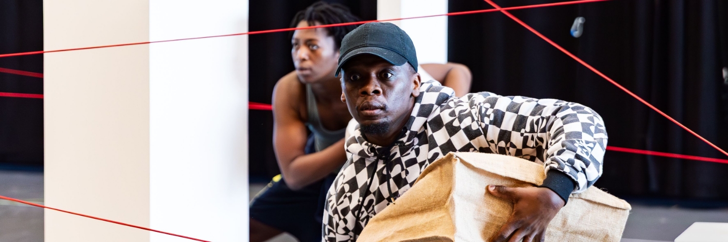 Performers staging a heist in Return to the Forest at Aviva Studios (Photography by Henri T)