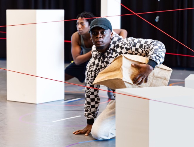 Performers staging a heist in Return to the Forest at Aviva Studios (Photography by Henri T)