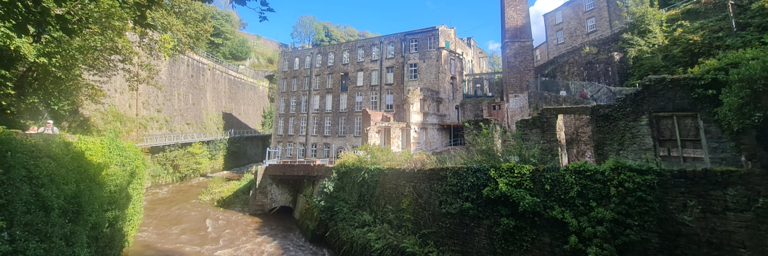 Torr Vale Mill and the Millennium Walkway in New Mills.
