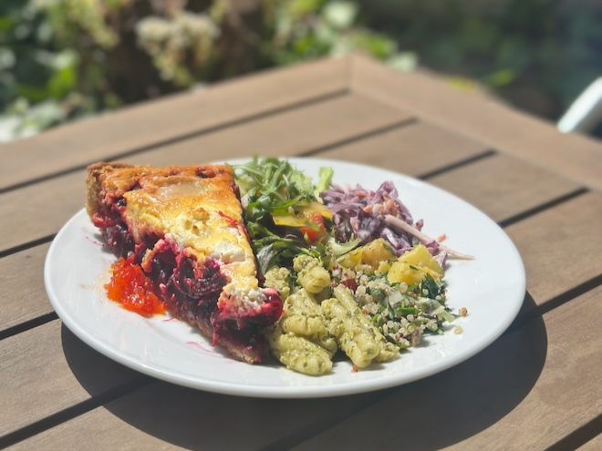 Roasted beetroot and goat's cheese tart with various salads at Shepley's Cafe in Glossop.
