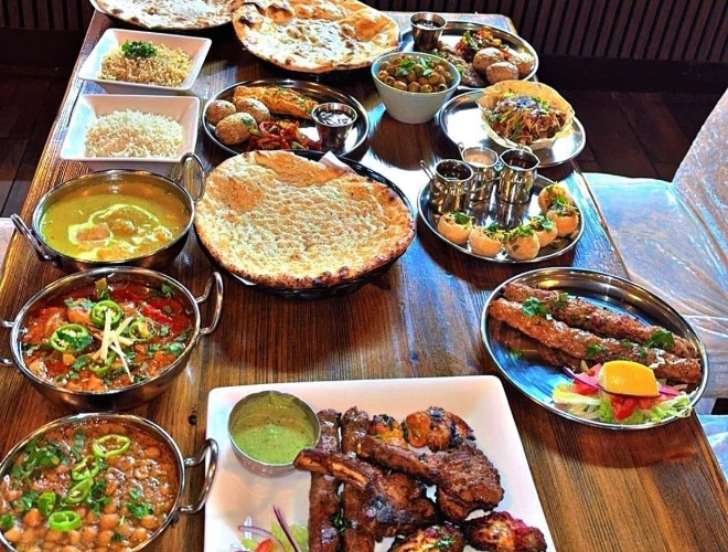 A table full of different dishes at Baba Tikka