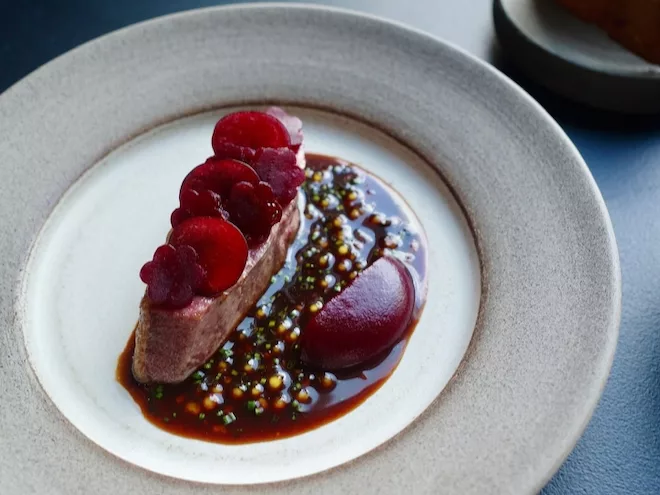 Dry-aged Sladesdown duck with a Boltardy beetroot purée with fresh cherry at Skof in Manchester.
