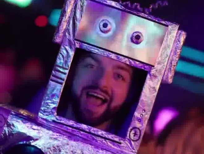 A dad dressed up as a robot at Raver Tots