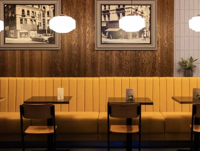 Egg-yolk yellow vinyl seating At Koffee Pot, Manchester's coolest greasy spoon