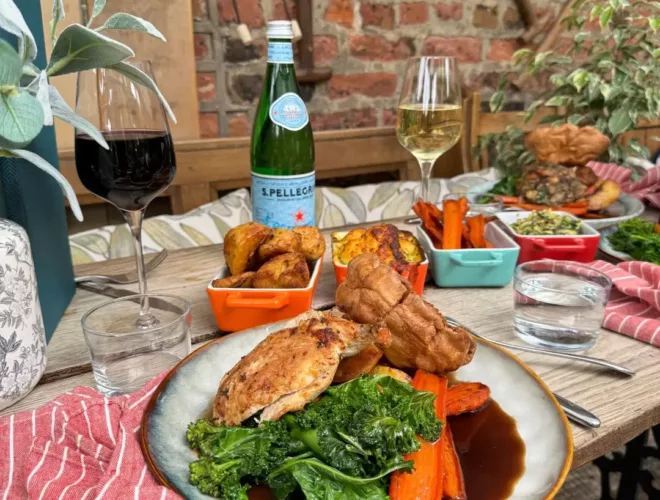 Yorkshire pudding, roast beef, carrots and wine at The Watering Can
