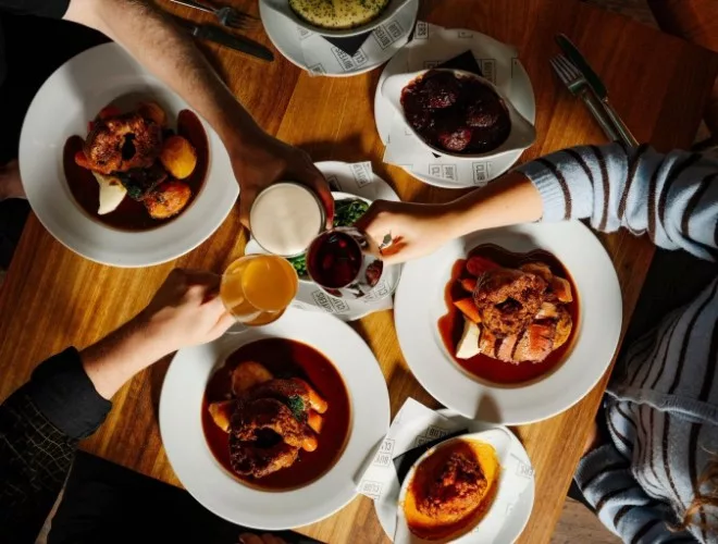 Sharing Sunday roast together at Buyers Club